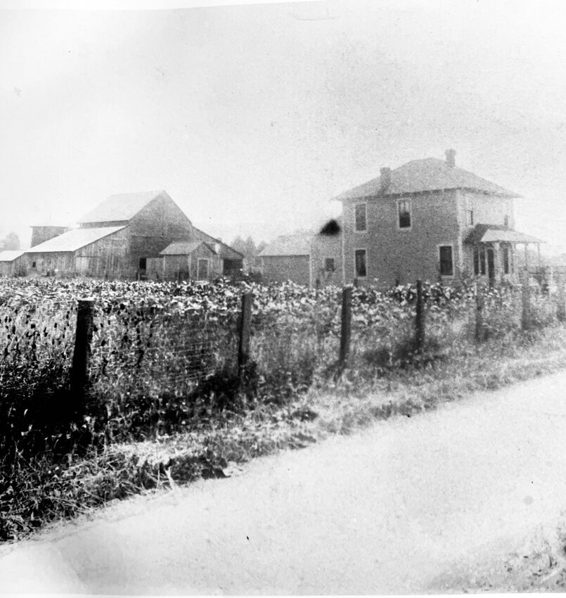This  turn-of-the-century photo of the Black house, barn and hopfields was provided by Susan Remund, who now resides on the property.