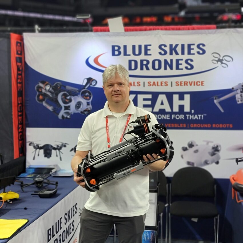 Blue Skies Drones owner Dale Hylton shows an underwater drone.