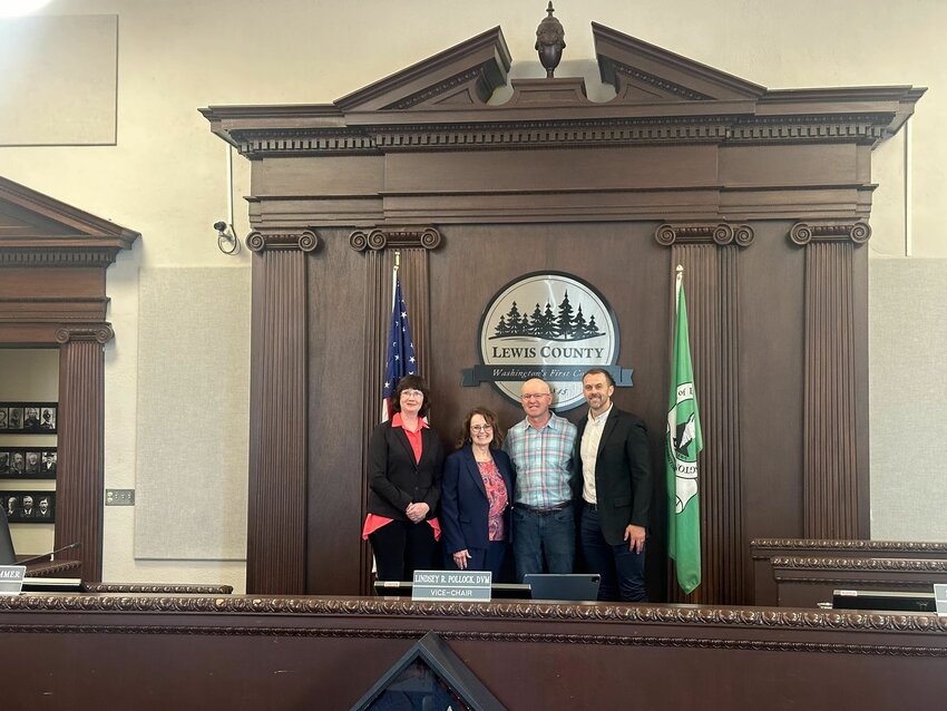 From left, Lewis County Commissioner Lindsey Pollock, former Chehalis City Manager Jill Anderson, former Centralia City Manager Rob Hill and Lewis County Commissioner Sean Swope during a Lewis County commissioners meeting on Tuesday, June 11.