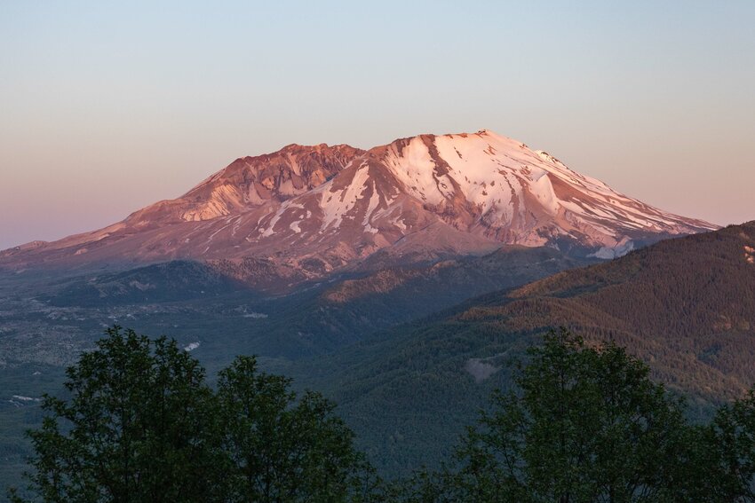 The sun sets on Mount St. Helens on Wednesday, June 12.
