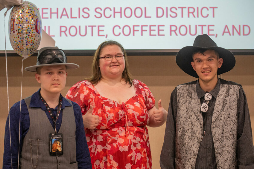 The Visions Academy class of 2024 poses for a photo after a graduation ceremony at Lintott Elementary School in Chehalis on Thursday, June 13. Pictured from left, John Striedinger, Morgan Walker, and Chance Nauman.