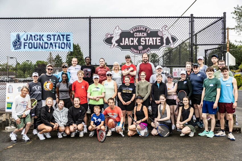 Attendees of the Jack State Tennis Invitational pose for a photo at the Jack State Courts at W.F. West High School in Chehalis on Sunday, June 30.