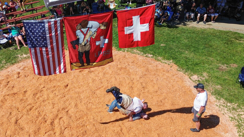 A Swiss wrestling match is photographed from above during the Lewis-Pacific Swiss Society&rsquo;s 61st annual Schwingfest on Saturday, July 6.