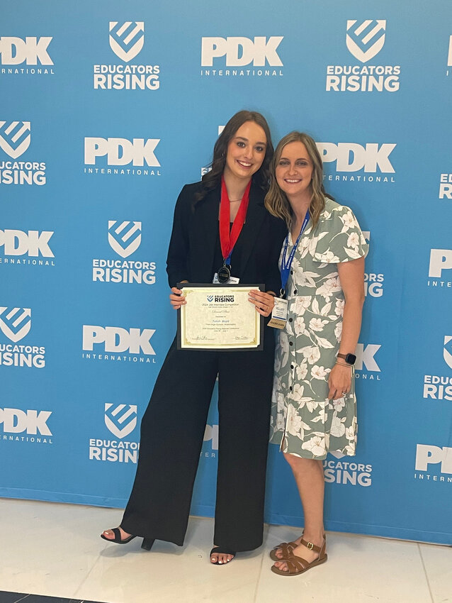 Taliah Boyd and Hillary Hull pose for a photo after Boyd took home second place in the job interview category at the 2024 Educators Rising National Conference in Washington D.C.