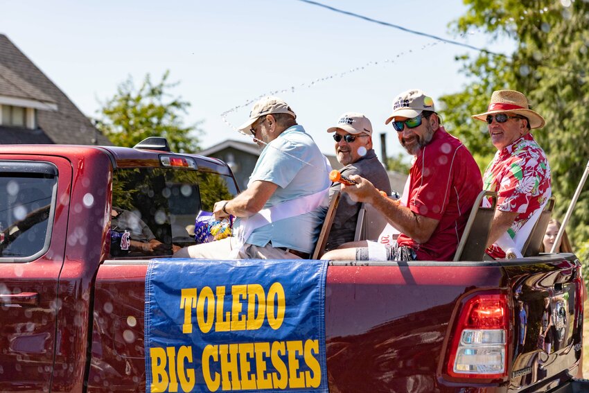 Big Cheese Carl Buswell sprays water onto the crowd during the Toledo Cheese Days Parade on Saturday, July 13. The 2024 Big Cheeses are Don Buswell Sr. and his sons Don, Carl, Guy and Alan. The Big Cheeses are essentially grand marshals at Cheese Days, which began on Thursday with the Big Cheese Social and ended with activities on Sunday. It was the 103rd Toledo Cheese Days festival.