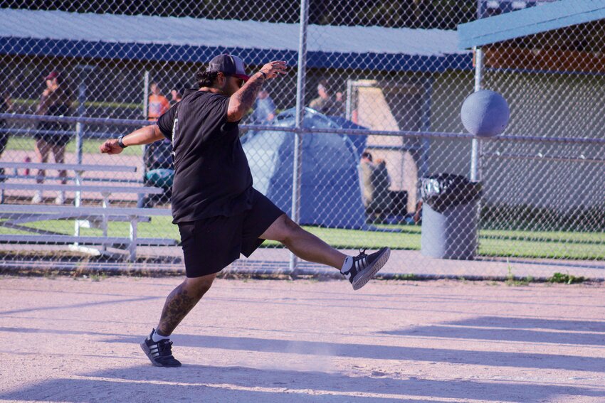 Socorro Scotto prepares to kick the ball during a City of Yelm Parks and Recreation summer kickball league contest at Longmire Park on July 10.