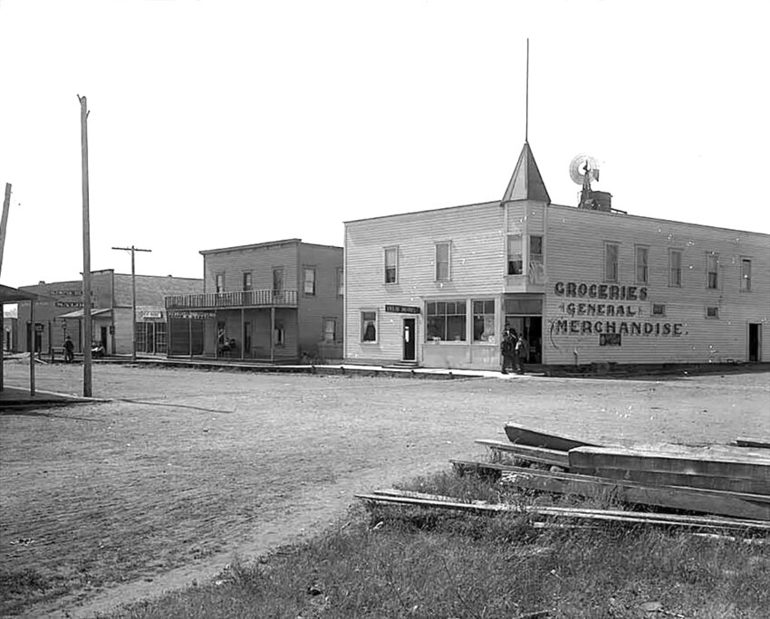 The Yelm street scene is photographed in 1909, 15 years prior to incorporation.