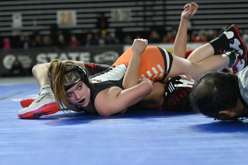 Centralia's Ramona Reinitz settles in for the pin at Mat Classic XXXV in February at the Tacoma Dome.