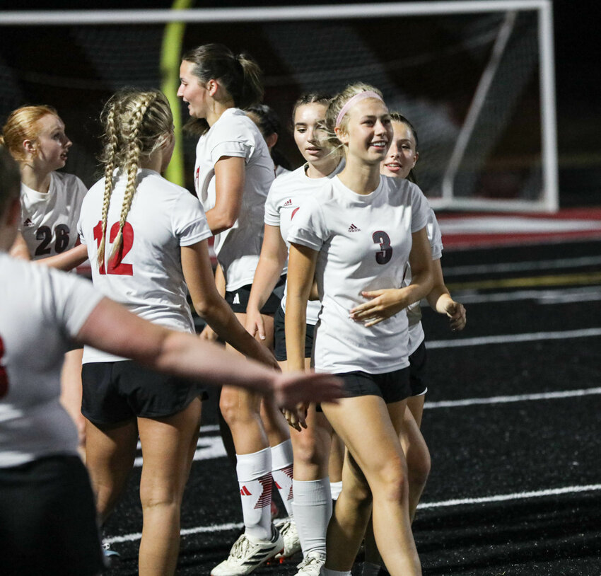 W.F. West's Ashlen Gruginksi (3) smiles after beating Centralia 3-1 in a pool play match on Saturday at the Battle on the Blacktop in Tenino.