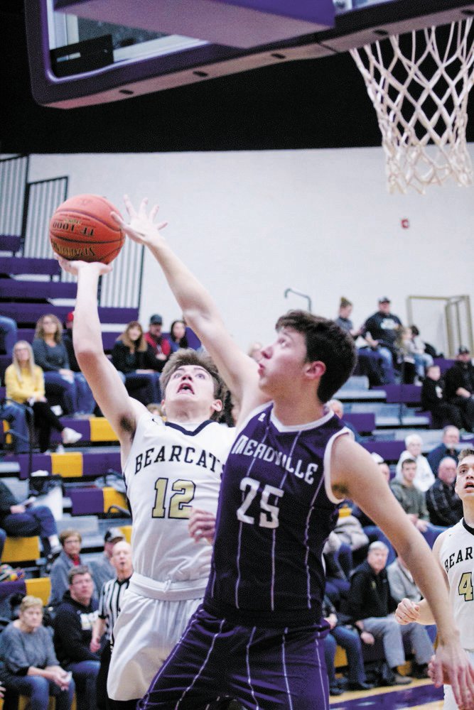 Cairo’s Justyn Gittemeier attempts a shot. Gittemeier had 13 points for the Bearcats in their 70-20 win over Meadville Tuesday night at the Salisbury Invitational.